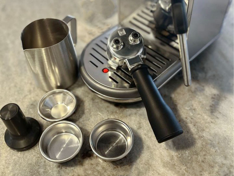 Breville Bambino - Portafilter, single & double-walled filter baskets, tamper, milk jug